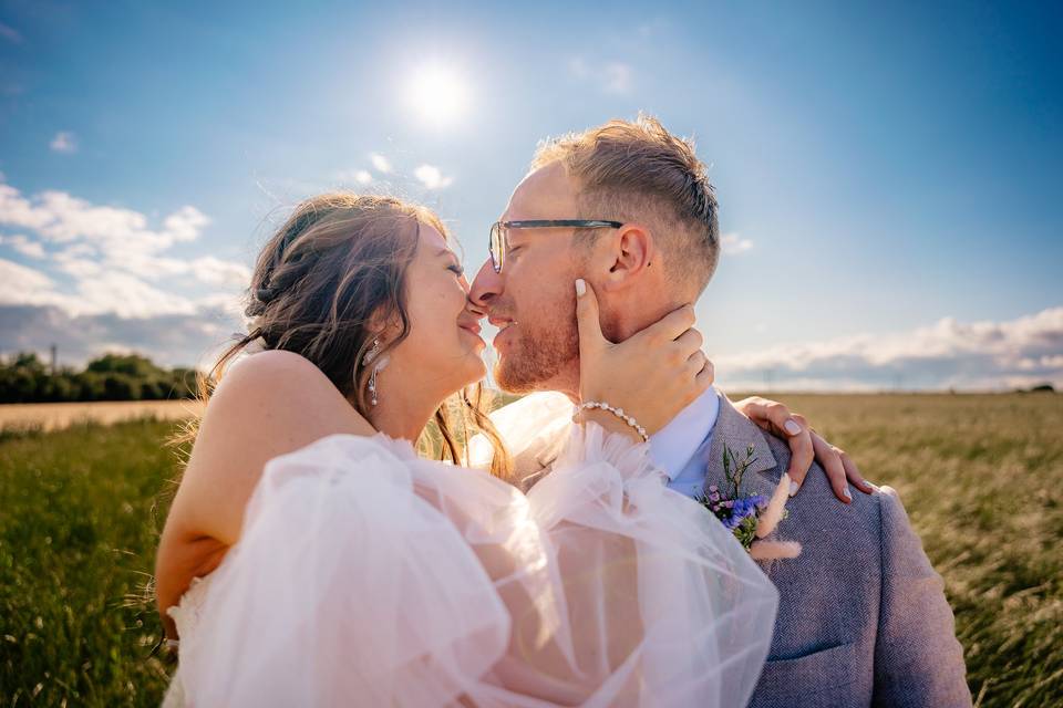 Bride and Groom kiss