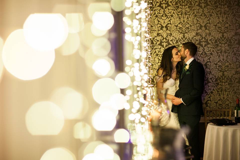 Kissing under the umbrella - Philip Bedford Wedding Photography