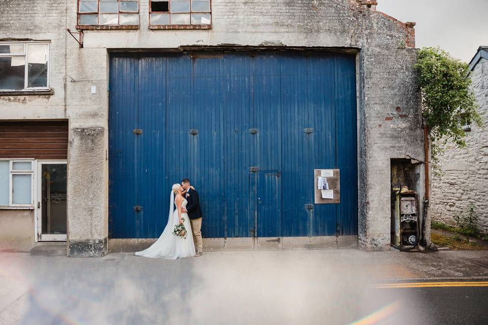 Bride and Groom blue door