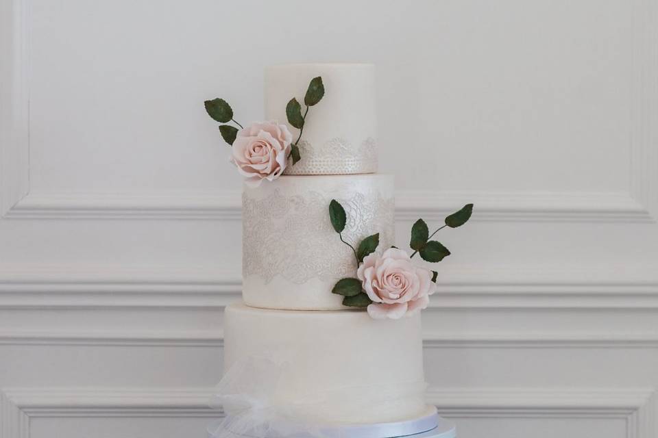 3 tier, sugar roses and lace.