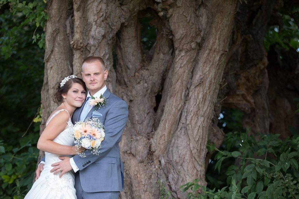 Amy and Shane by the tree