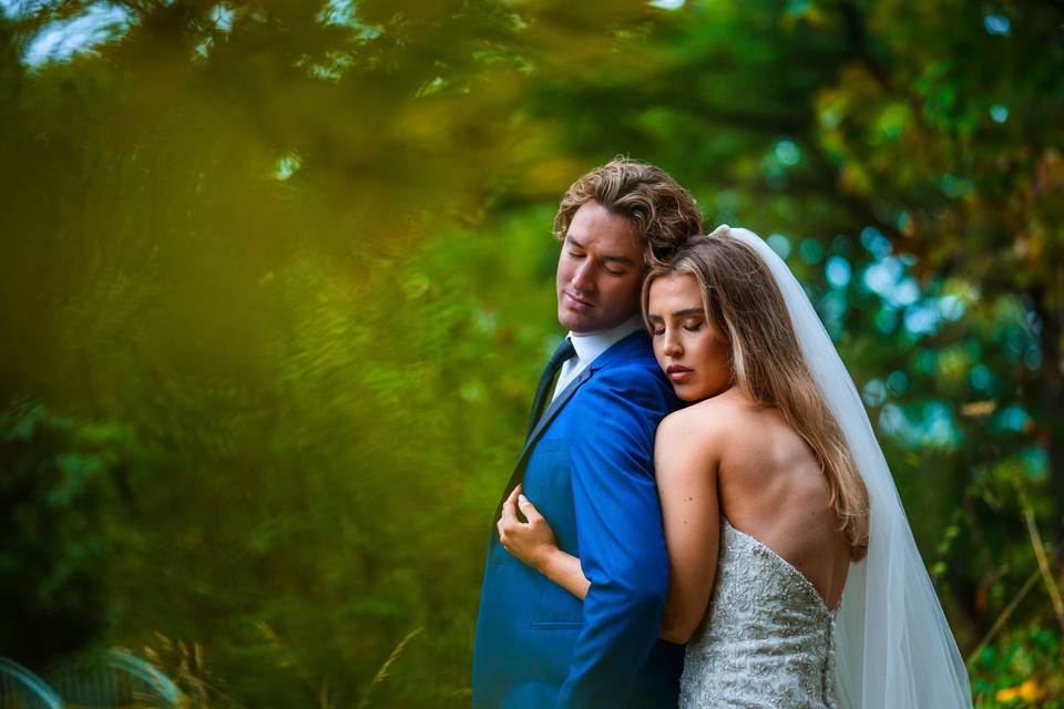 Bride & groom through bokeh