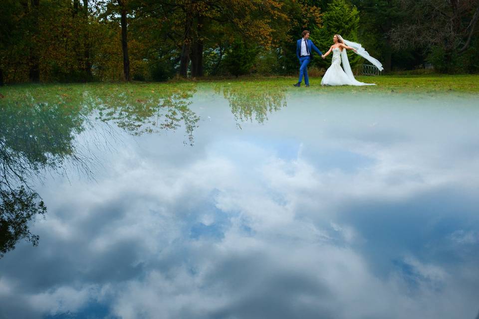 Sky reflection with couple