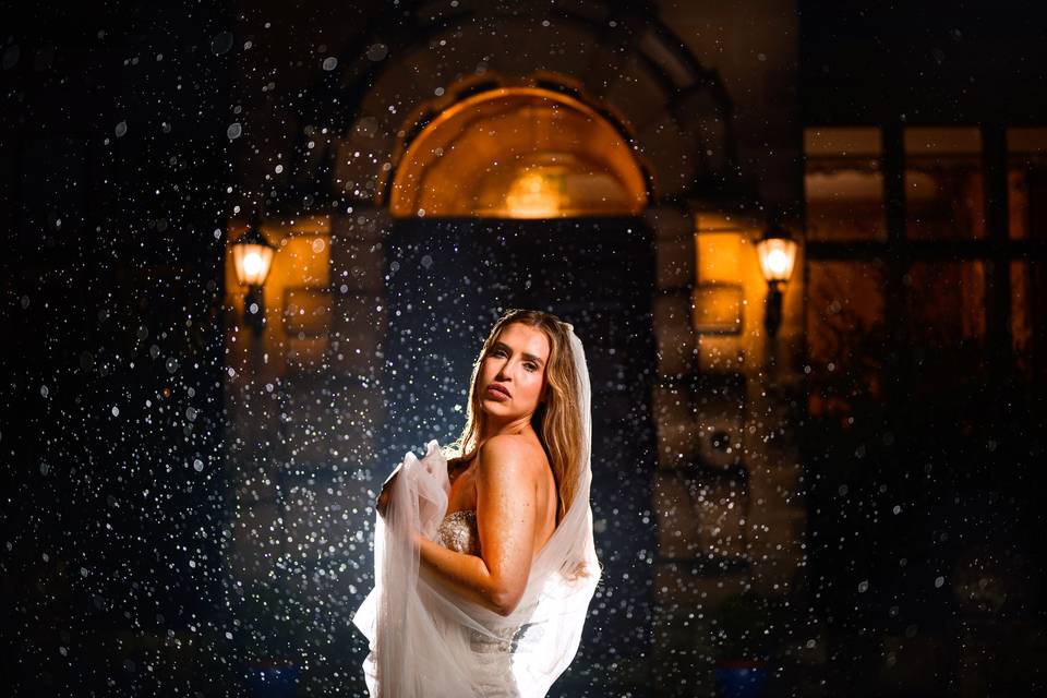 Backlit rain with bride