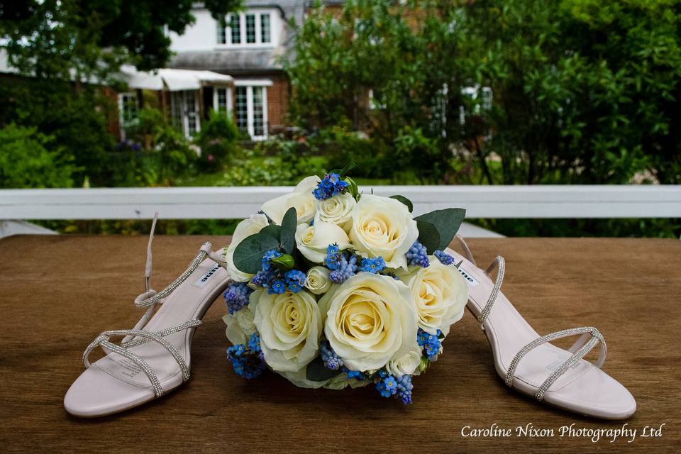 Wedding shoes and flowers