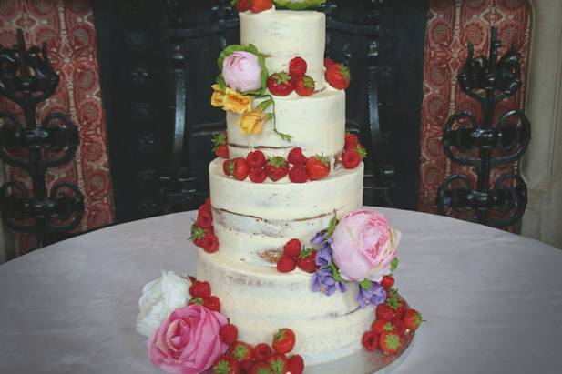 Berries and petals cake decor