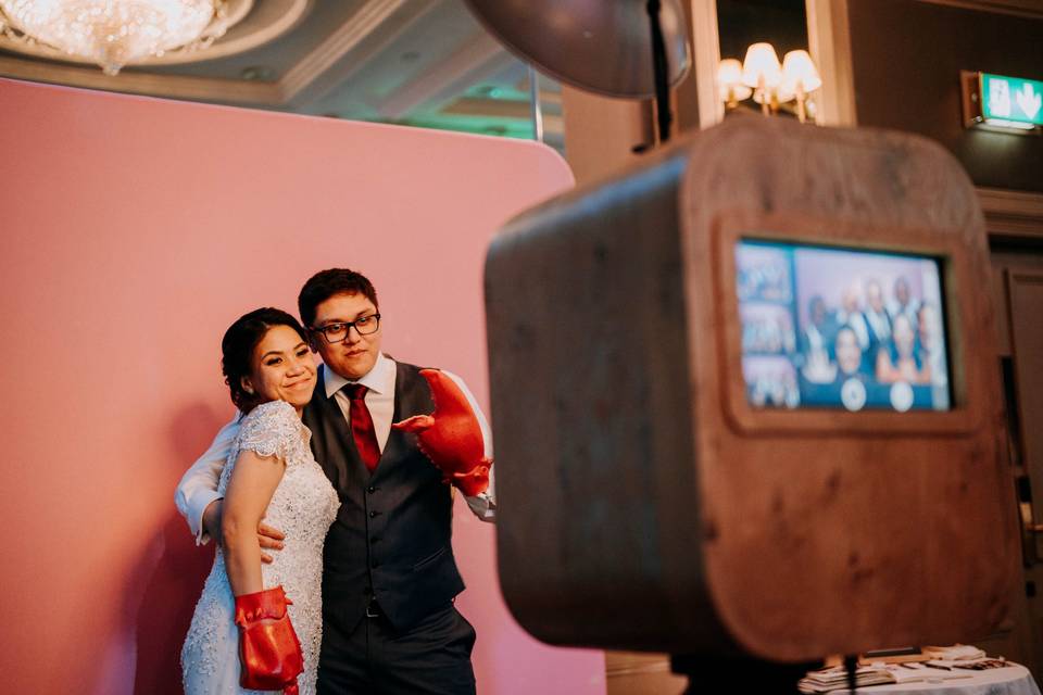 Bride and groom with pink back