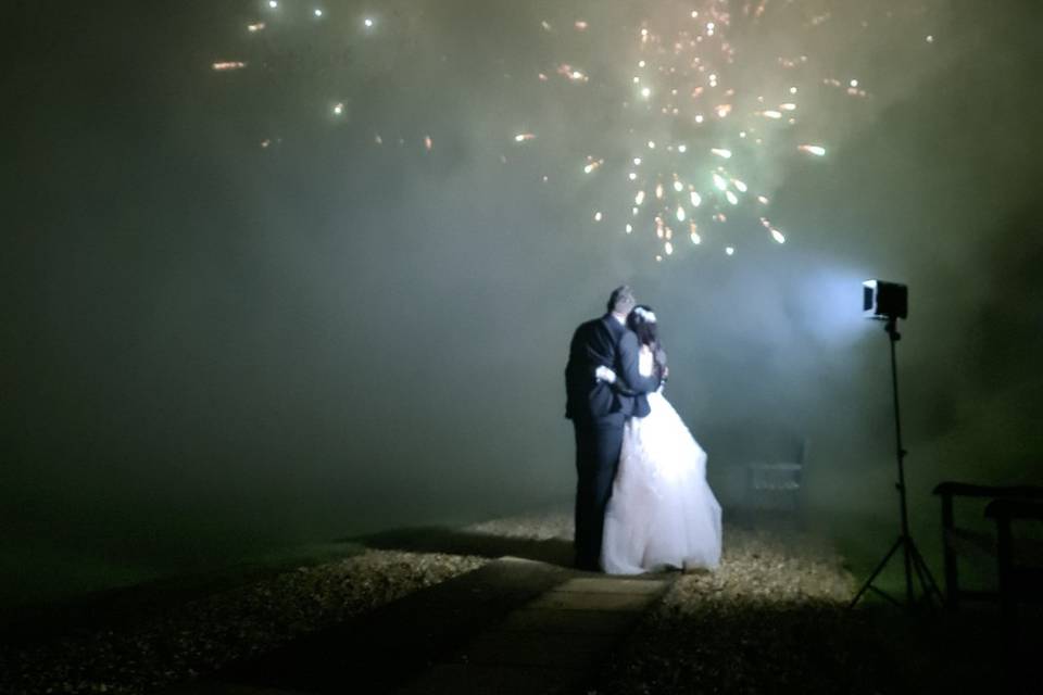 Couple shot during fireworks