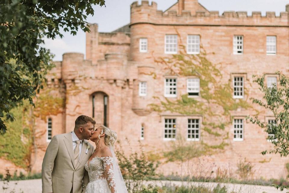 Couple in front of castle