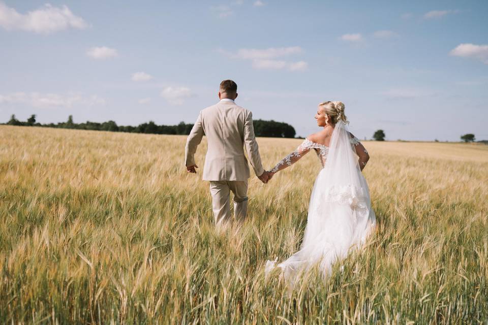 Couple in field near castle