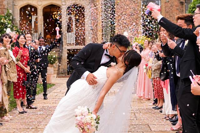 Wedding confetti kiss.