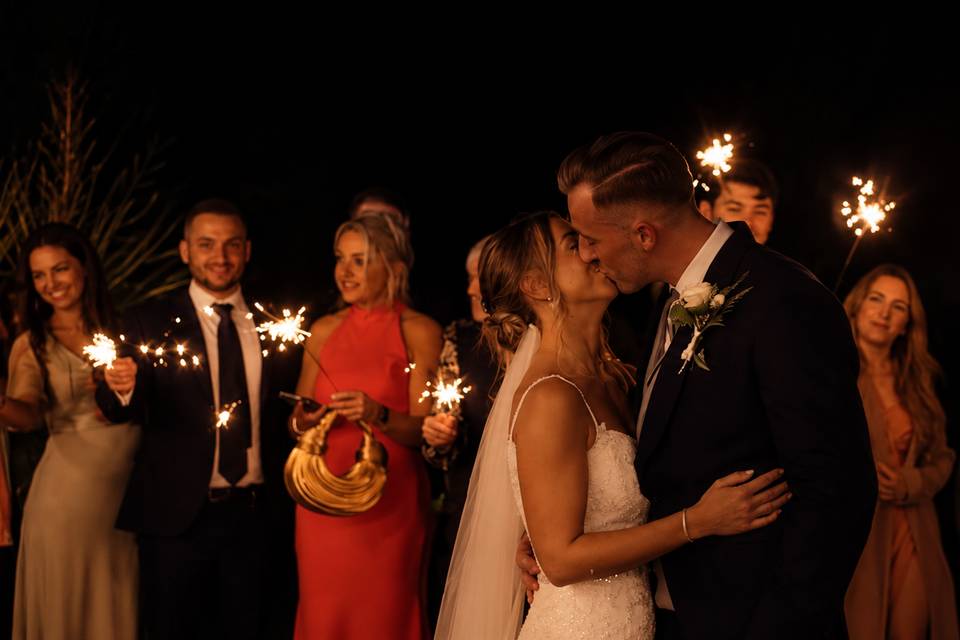 Sparklers at night.