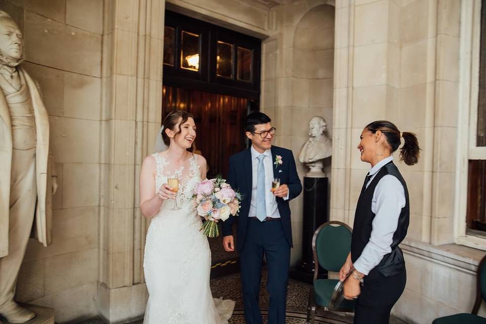 Laughing bride and groom