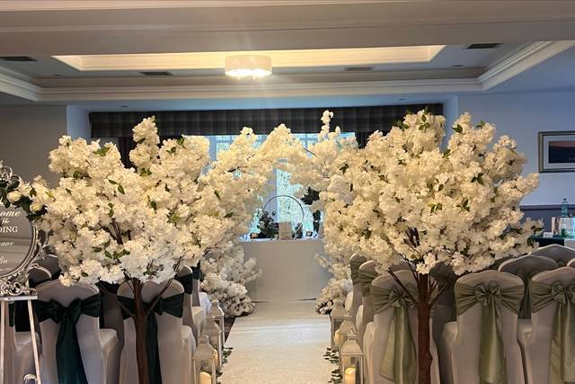 Ceremony in suite with blossom