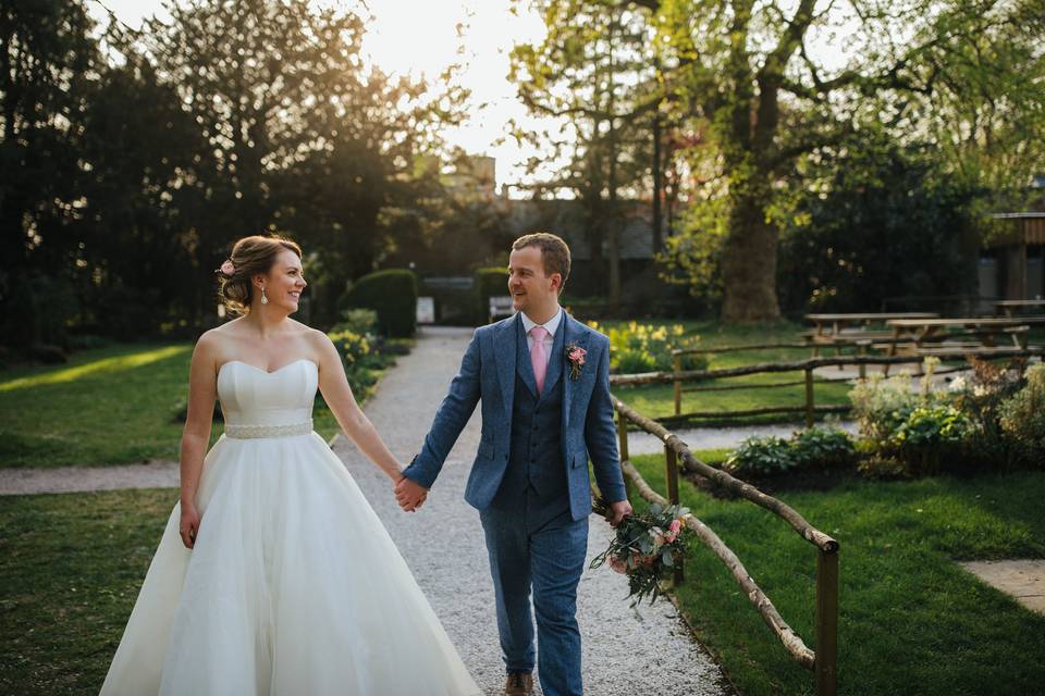 COUPLE WALKING AROUND GROUNDS