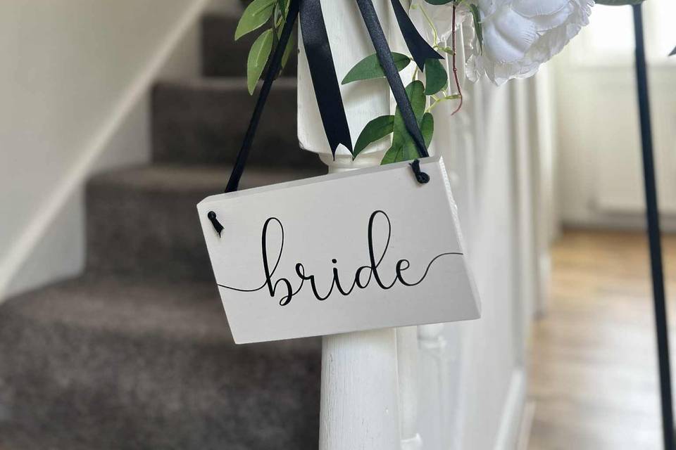 Hanging bridal sign