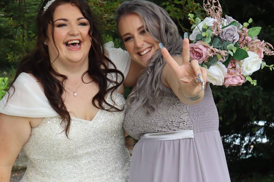 Bride and bridesmaid