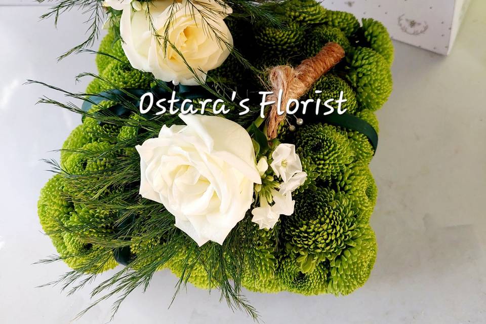 Rose and tree fern buttonhole