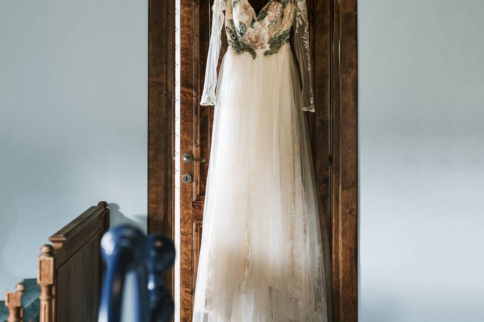 Wedding dress hanging up