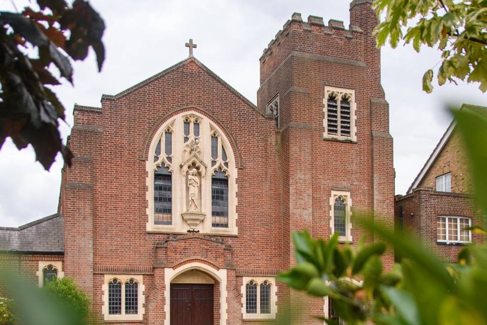 Church surrounded in greenery.