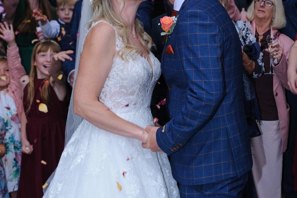 A kiss, wrapped in confetti.