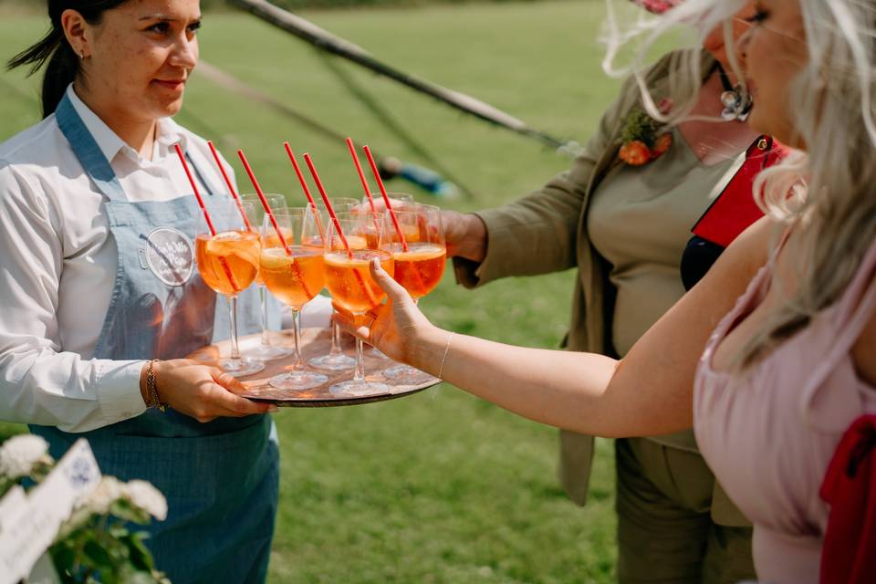 Aperol spritz being served