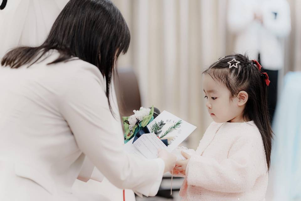 Rehearsing with flower girl