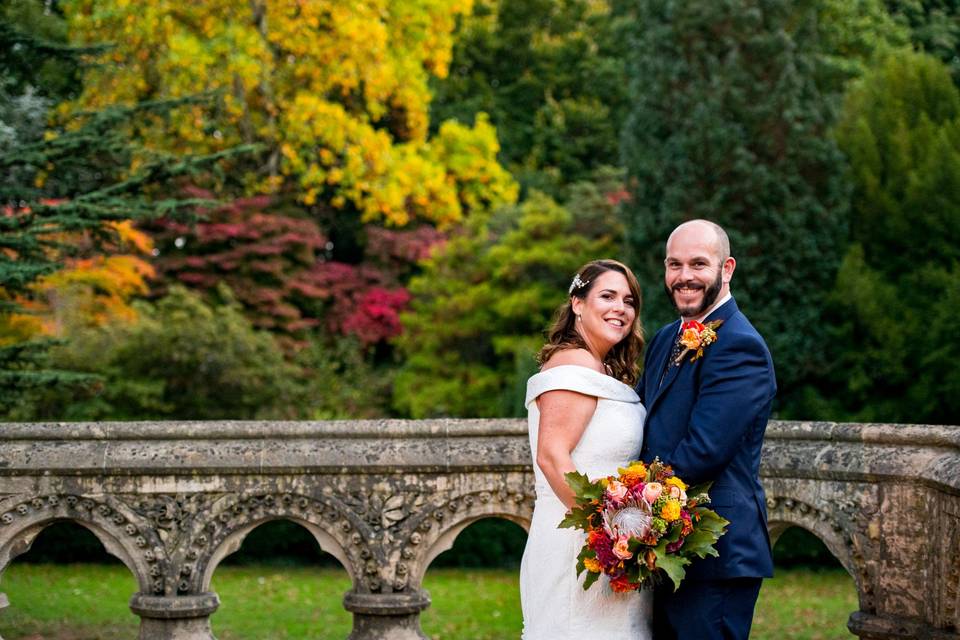 Smiling with botanical backdrop
