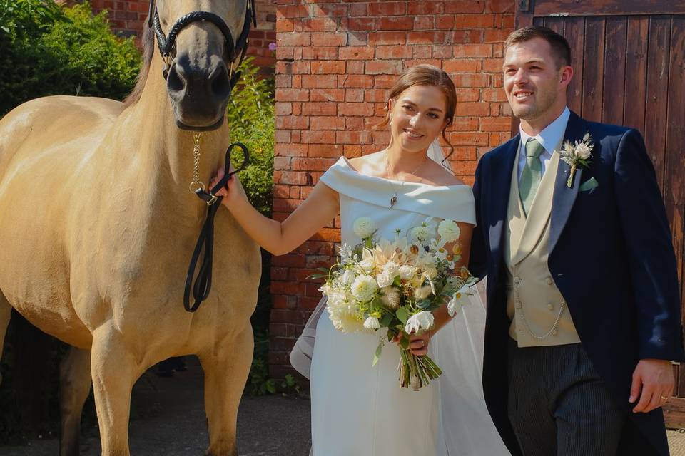 Emily and Josh with a horse