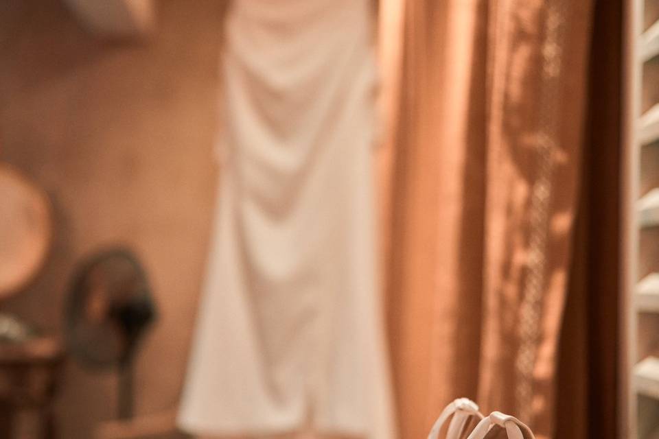 Bridal dress and shoes getting