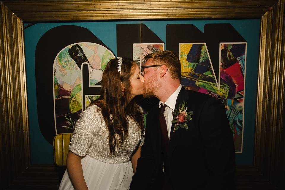 Bride and groom kiss