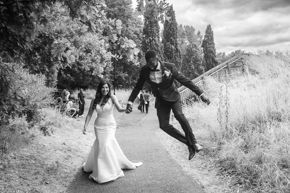 Groom jumping for joy