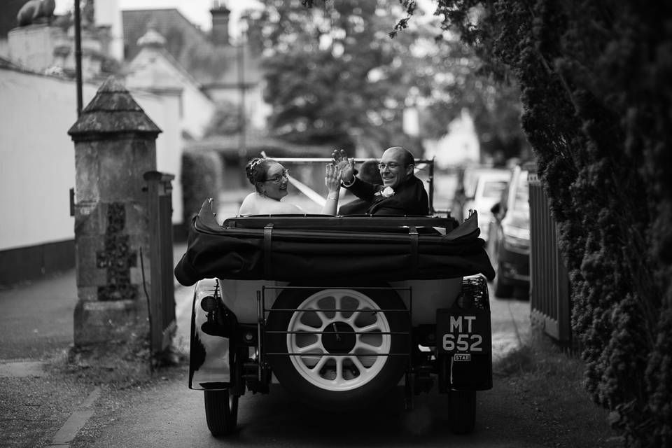 Newly weds in car