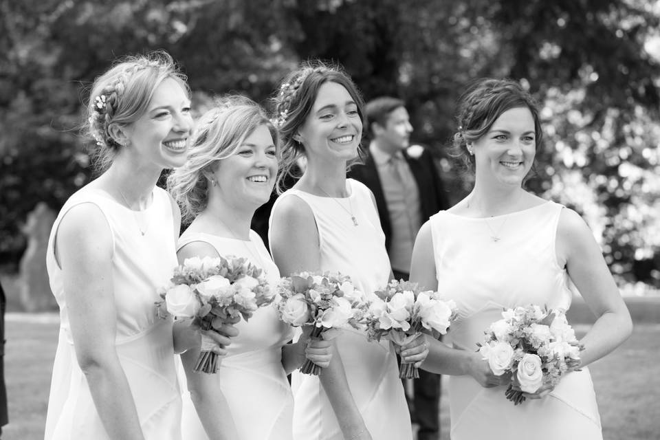 Bridesmaids and bride