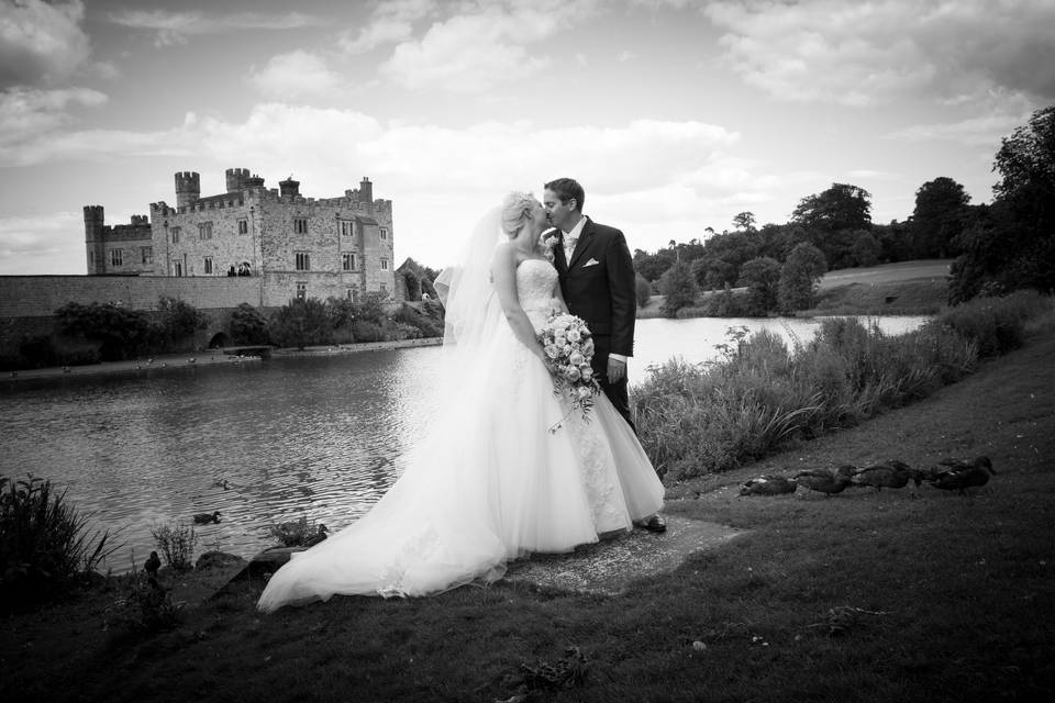 Bride and groom with castle