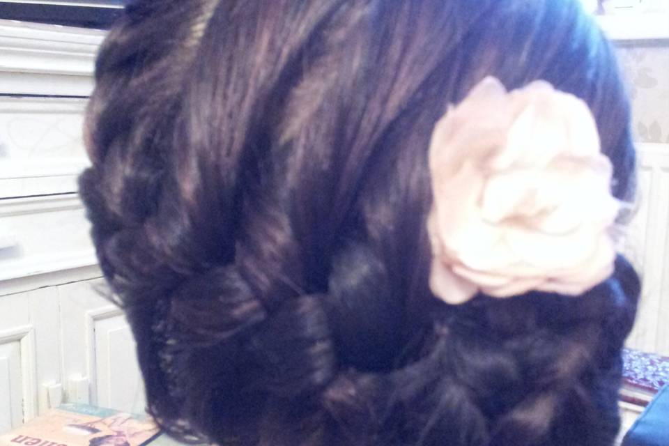 French plait into bun on side