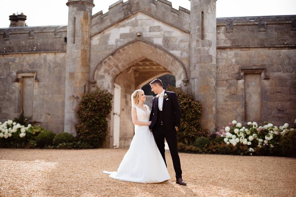 Groomsmen in front of castle