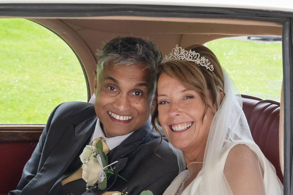 Happy couple in the car