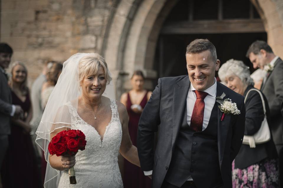 Newly weds leave church