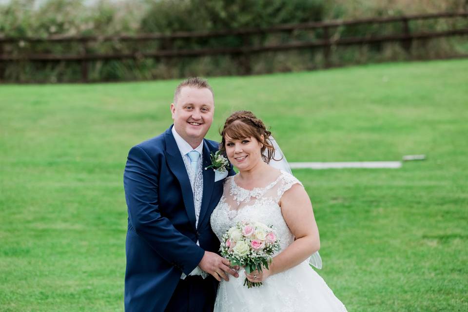 Newlyweds by the water