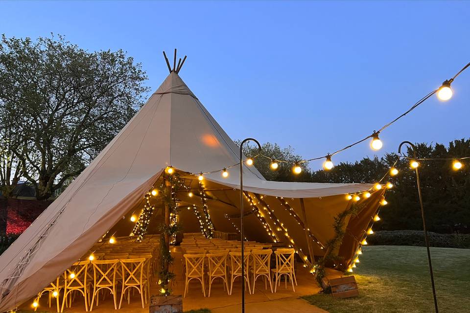 Outside wedding in a tipi