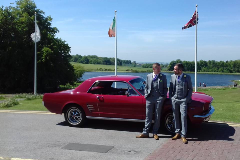 Men arrive in Red Mustang