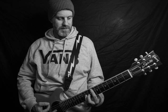 Joe showing his guitar off
