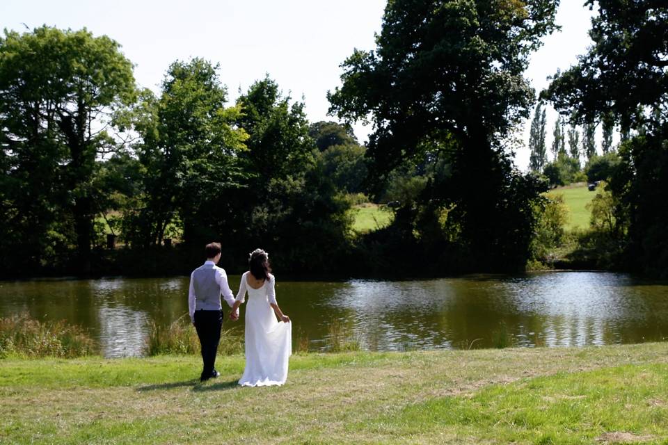 Couple Walking To Lake