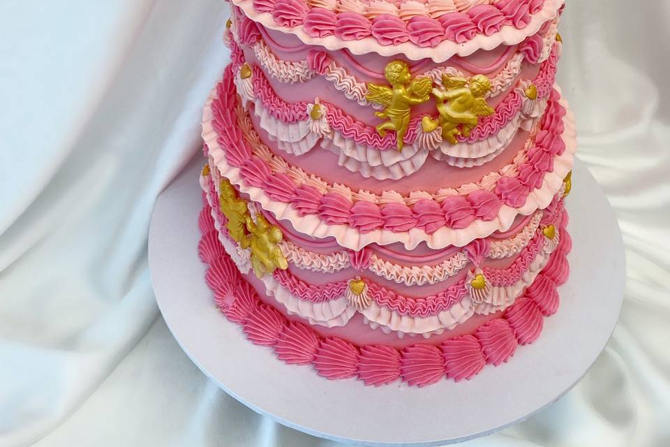 Three-tier pink wedding cake