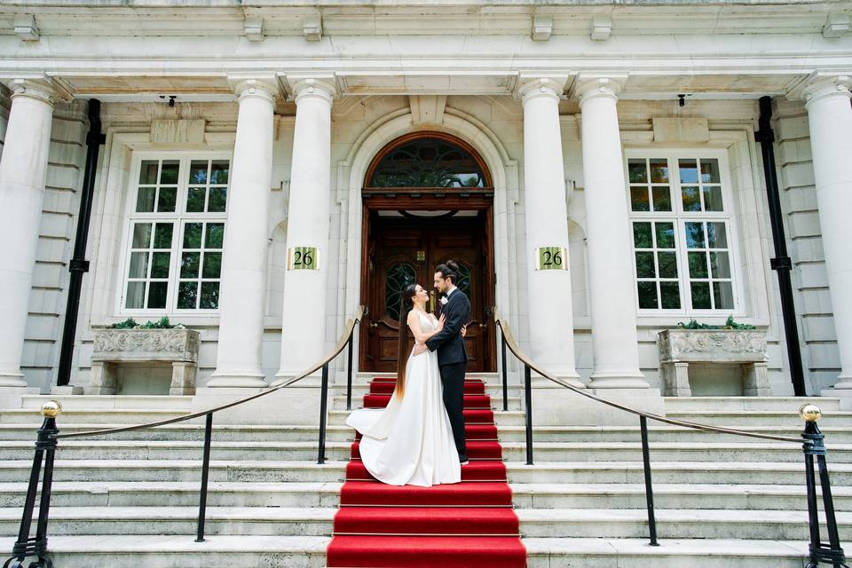 Couple on Stairs to the Hotel