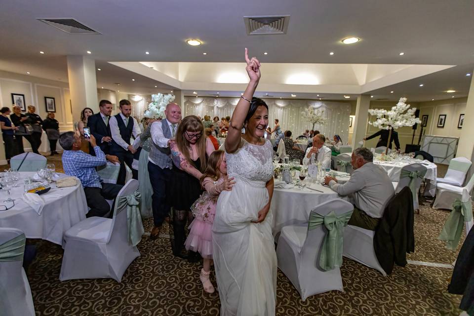 Bride leading the conga