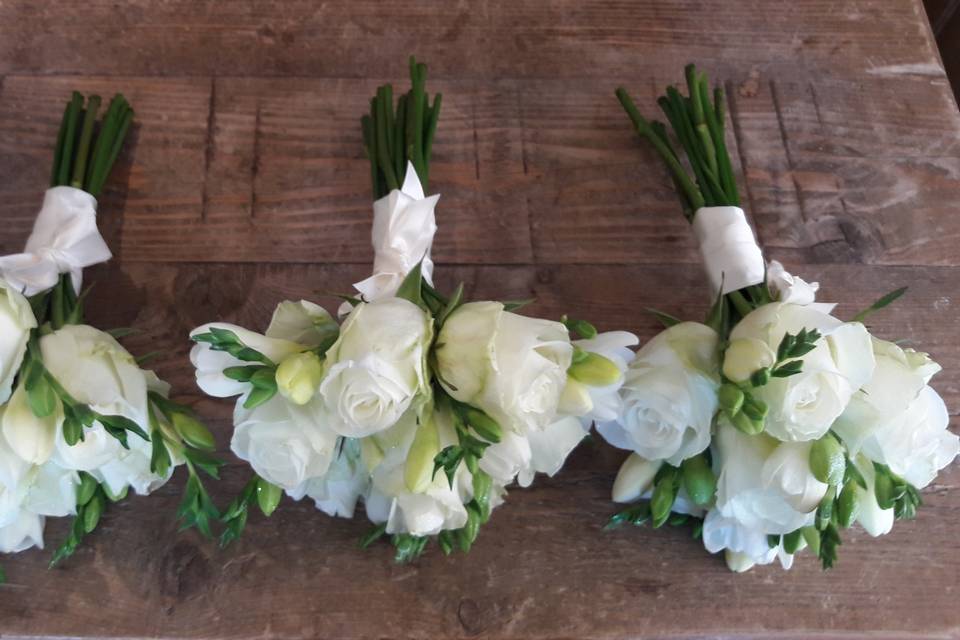 Trio of all white posies