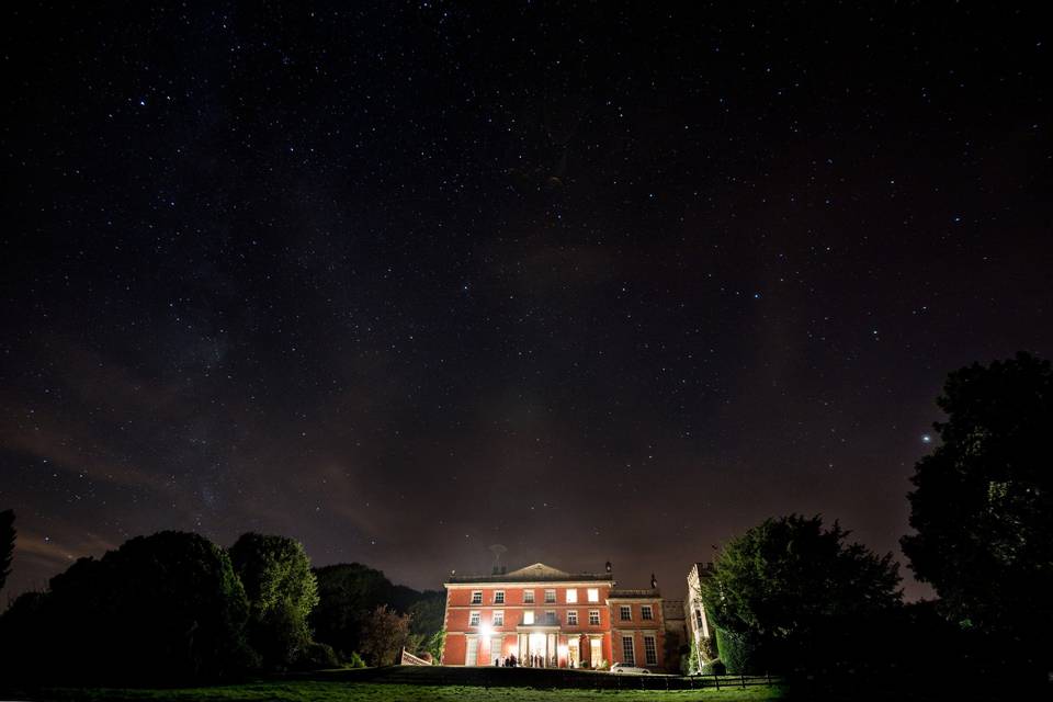 Homme House at night