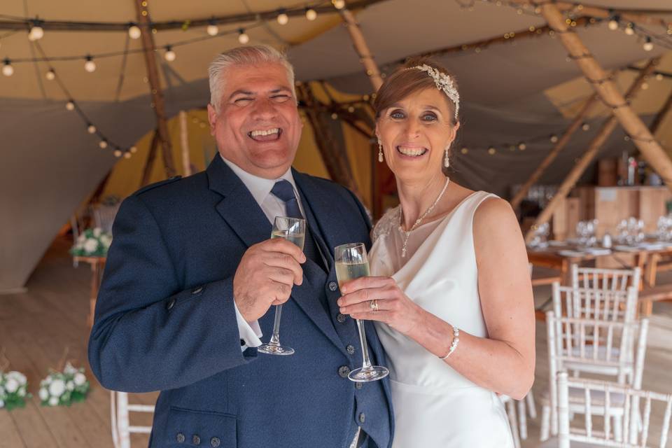 Smiling and sharing a toast